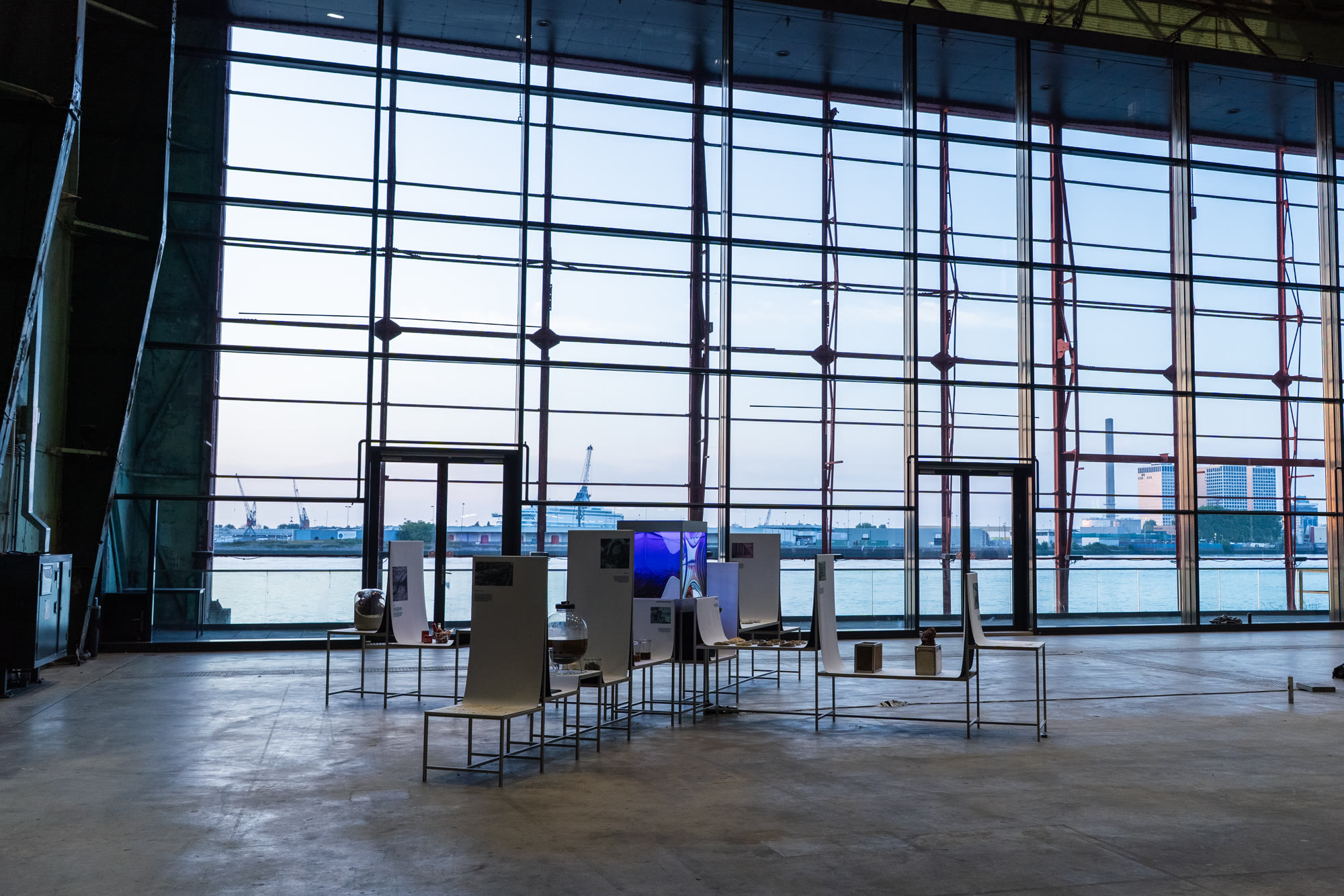 The exhibition at dusk with harbour view